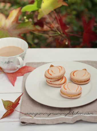 Pumpkin shaped pumpkin French macaron cookies are perfect for Thanksgiving or fall.