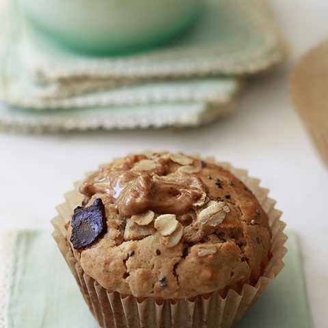 Peanut butter oatmeal muffin with chia seeds and chocolate chunks.