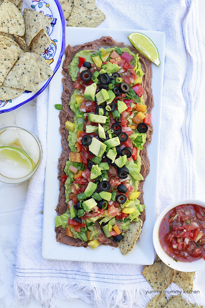 This healthier Mexican bean dip is vegetarian and vegan. It's the best game day appetizer. 