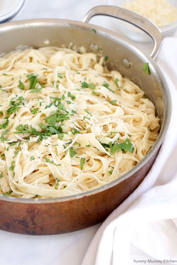 Creamy vegan cauliflower pasta sauce with fettuccini noodles and parsley. We love this delicious vegan pasta recipe! 