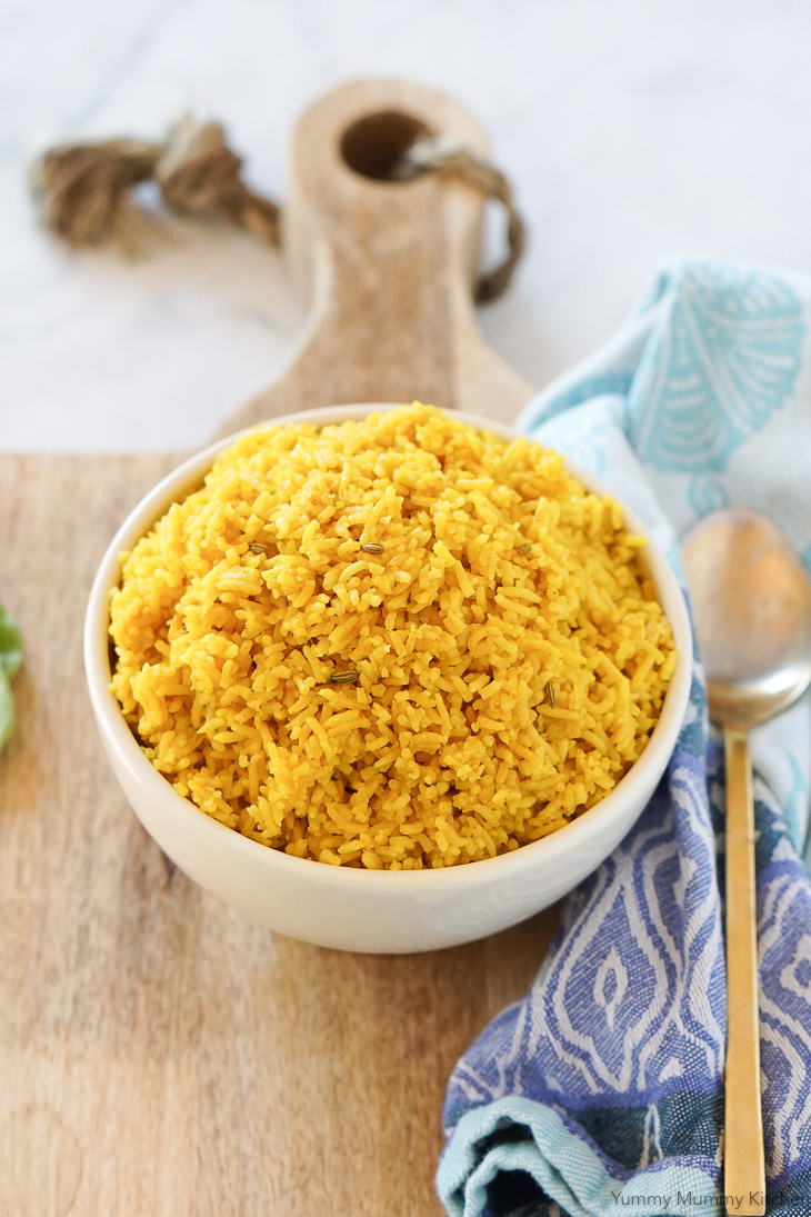 Beautifully golden turmeric rice with Indian spices. This easy turmeric rice is made in the Instant Pot or rice cooker and is vegan and gluten free. It's the perfect side for Indian curries or any main dish!
