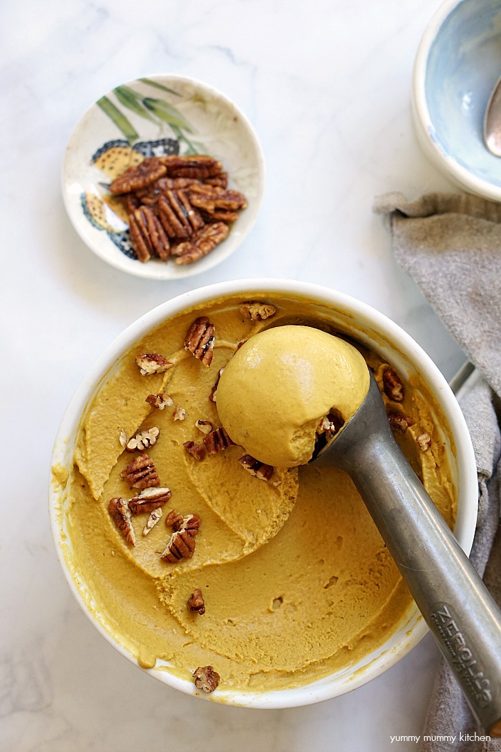 Vegan pumpkin pie ice cream made with healthy ingredients like coconut milk and maple syrup and topped with pecans.