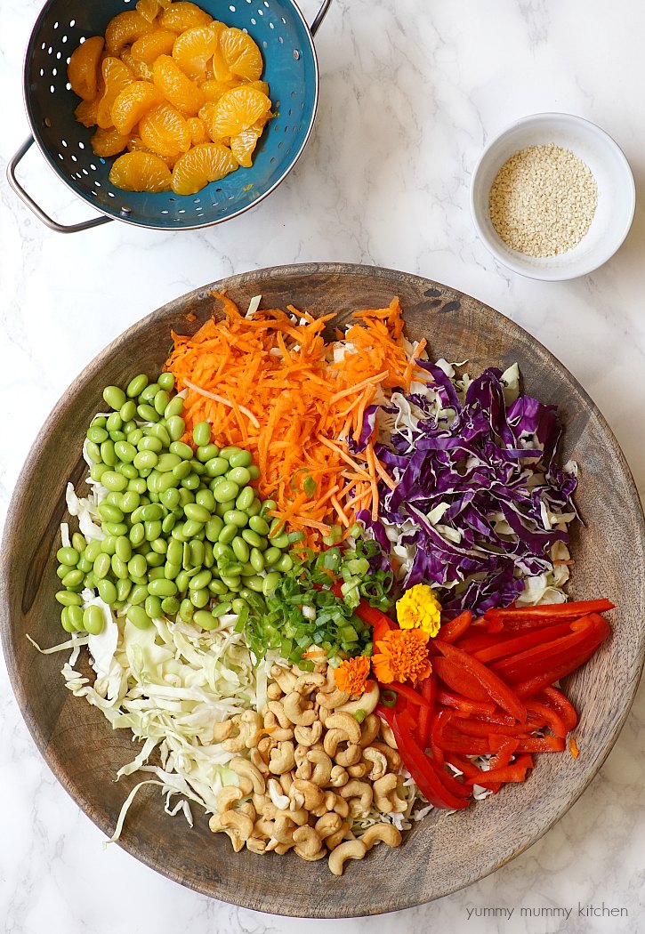 This colorful vegetarian Chinese inspired salad has edamame, cashews, cabbage, mandarin oranges, and a delicious light sesame ginger dressing. 