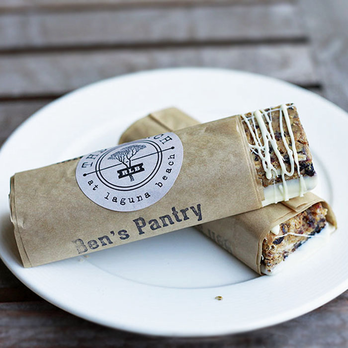 Two granola bars wrapped in parchment from Ben's Pantry at the Ranch at Laguna Beach. 