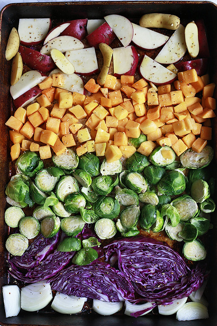 Roasted fall and winter vegetables roasted in a sheet pan for Buddha bowls