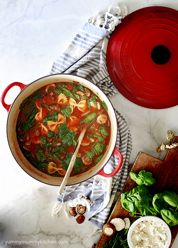 Vegetarian lasagna soup in a red le creuset pot. 