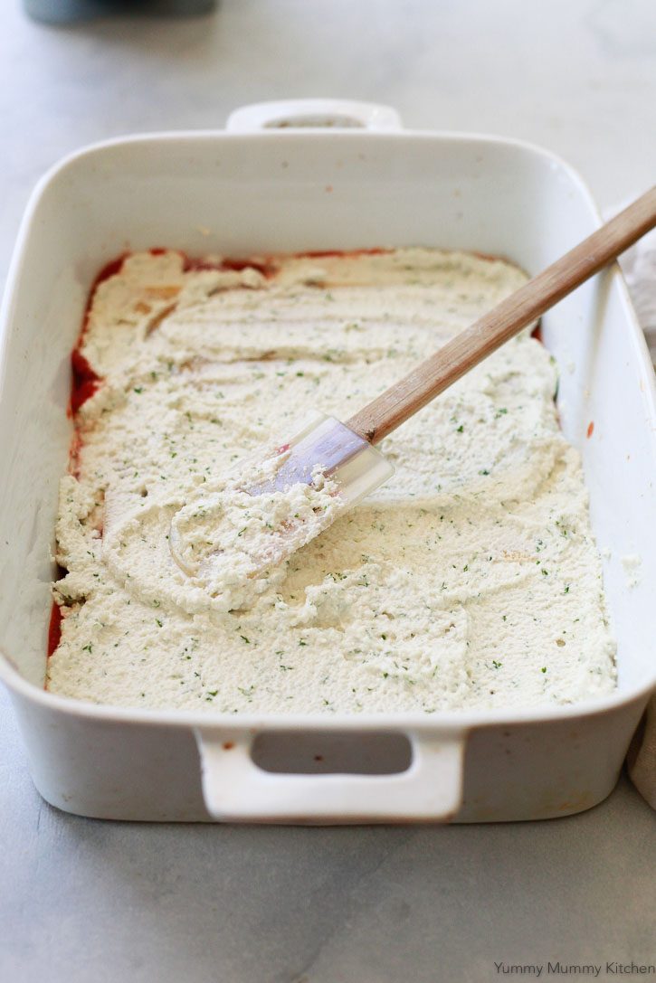 Vegan almond ricotta with parsley gets smoothed into a layer in this delicious vegan lasagna recipe. 