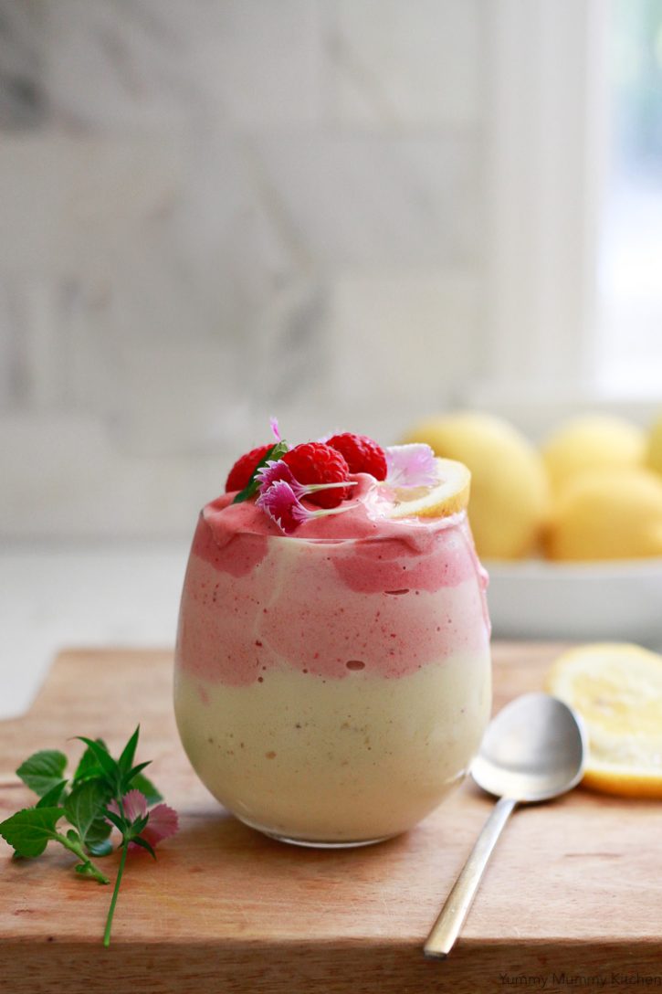 Beautiful layered lemon smoothie with strawberry and turmeric. 