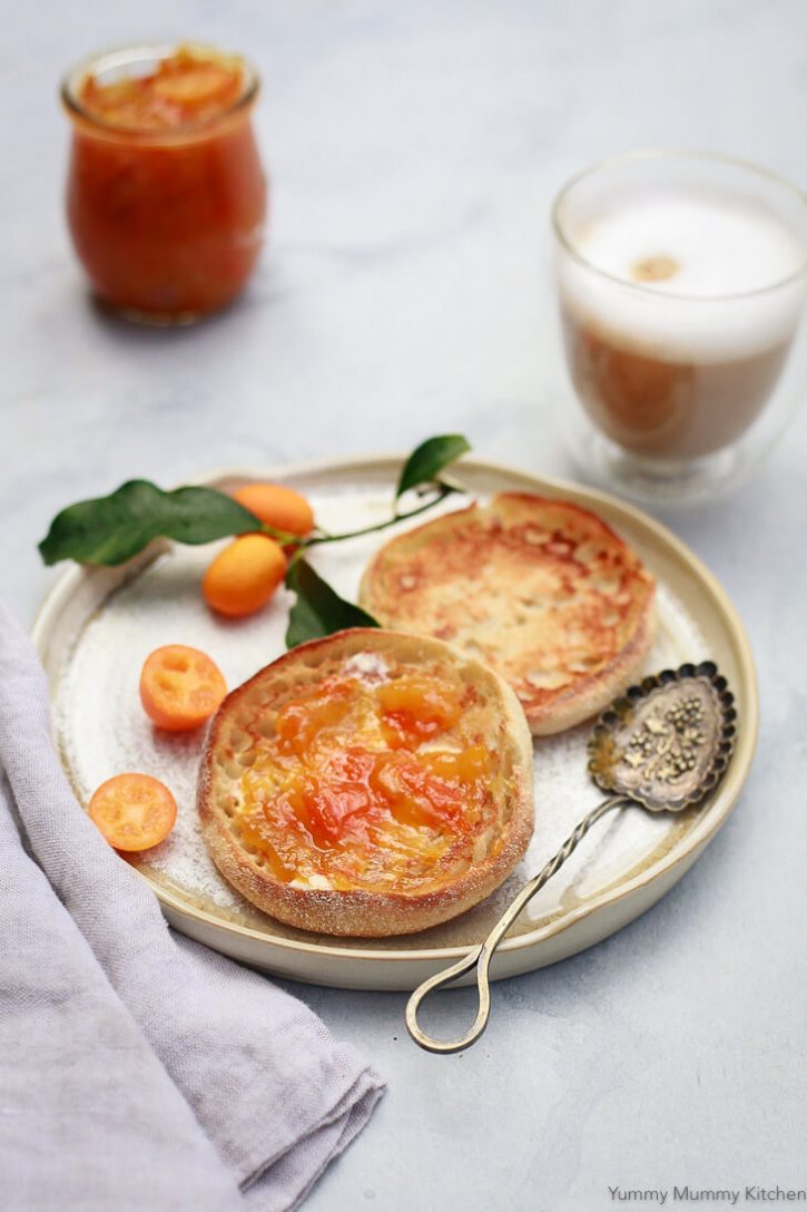 English muffins with homemade kumquat marmalade and coffee make a beautiful breakfast. This easy spiced kumquat marmalade is refined sugar free and easy to make. It's a nice homemade holiday hostess gift too! 