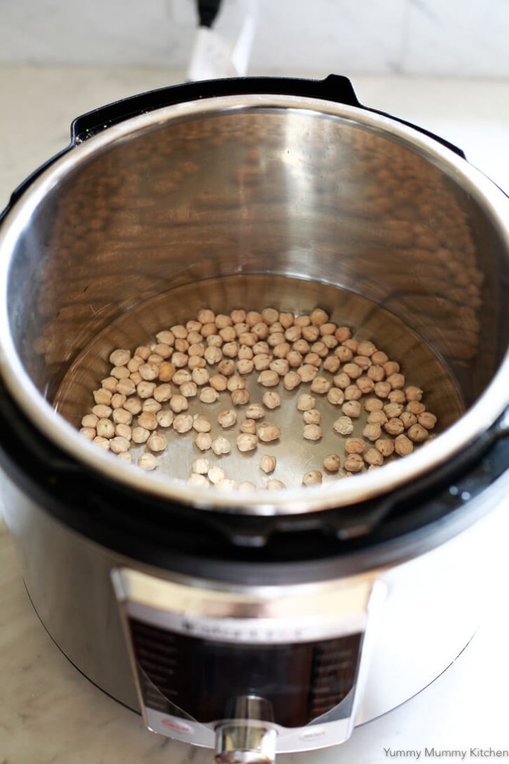 Dried chickpeas and water in an Instant Pot Ultra pressure cooker before cooking. 