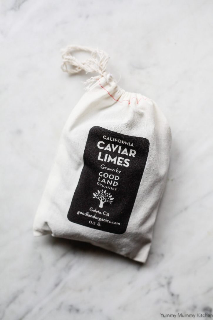 A canvas bag filled with caviar limes from Good Land Organics, sold by Fruit Stand. 