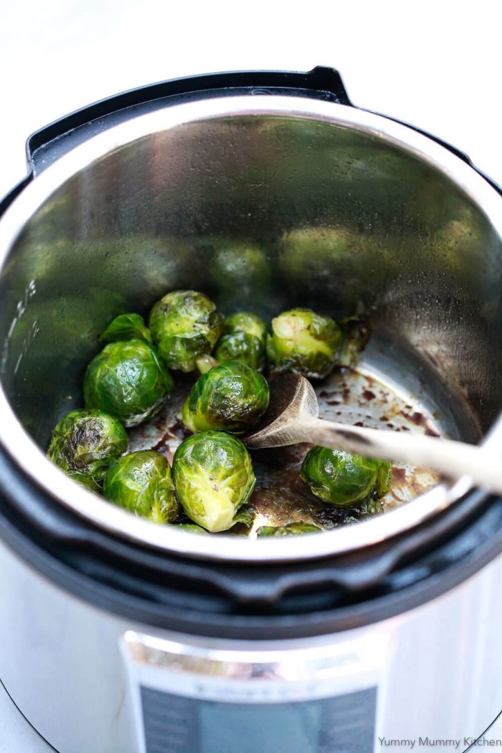 Whole balsamic glazed Brussels Sprouts inside an Instant Pot pressure cooker. How to cook Brussels sprouts in the Instant Pot. 