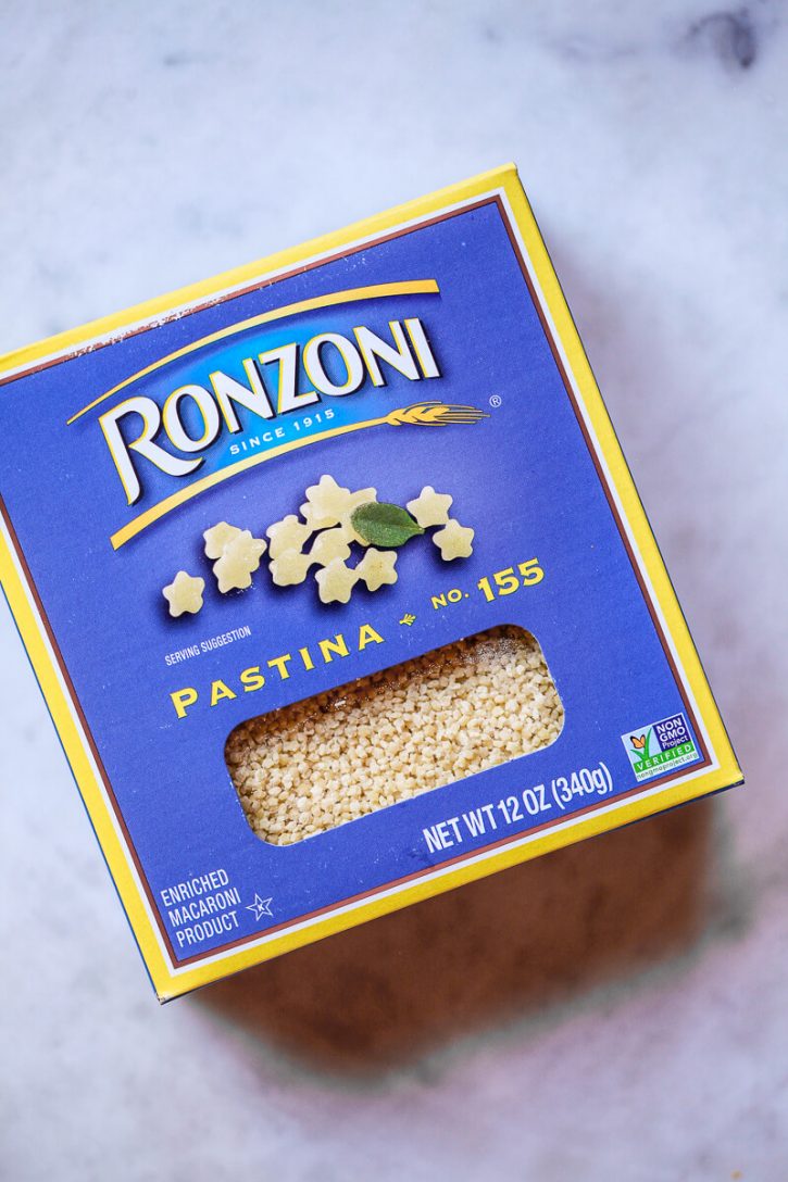 Photo of a box of ronzoni pastina on a kitchen counter. 