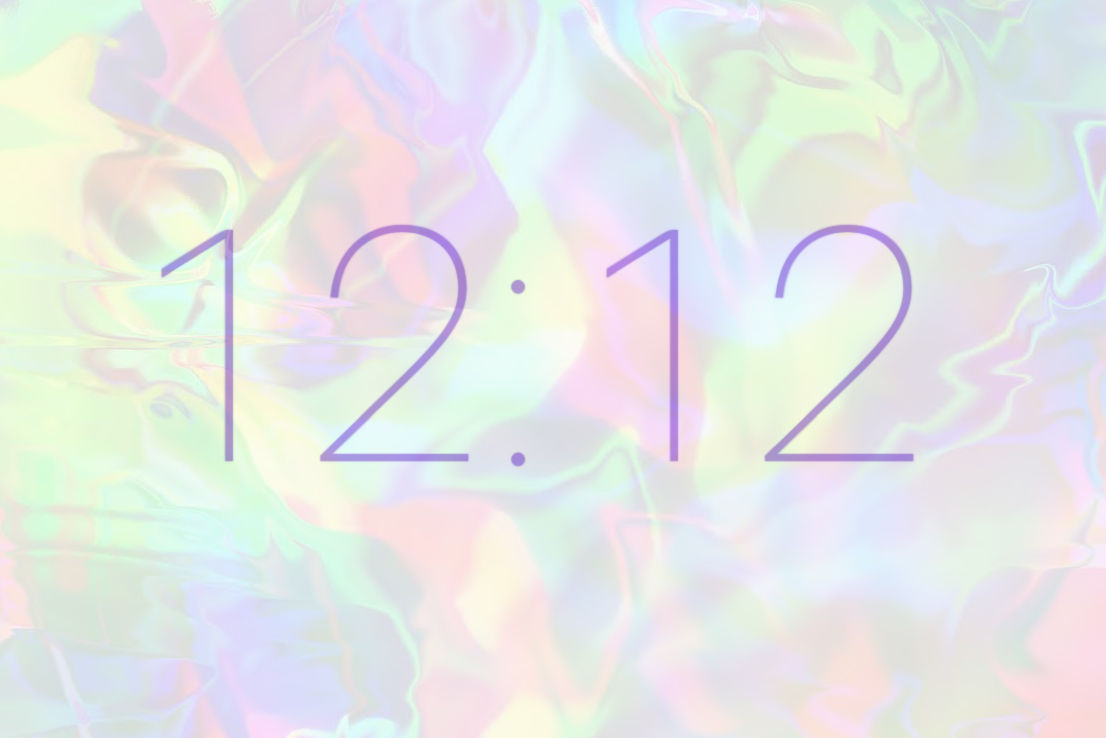 A dreamy pastel background with purple 12:12 overlay. 