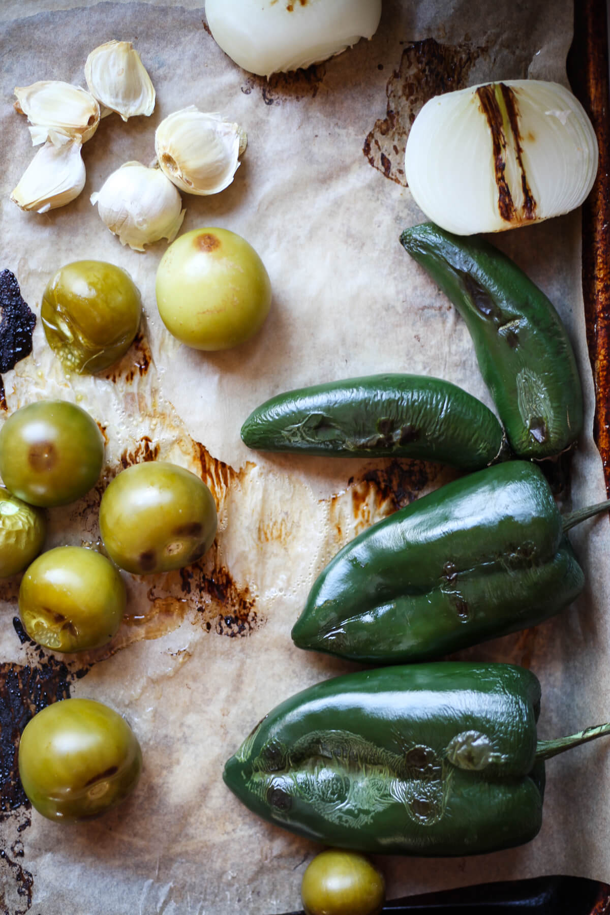 Roasted tomatillos, poblano and jalapeno peppers, onion, and garlic.