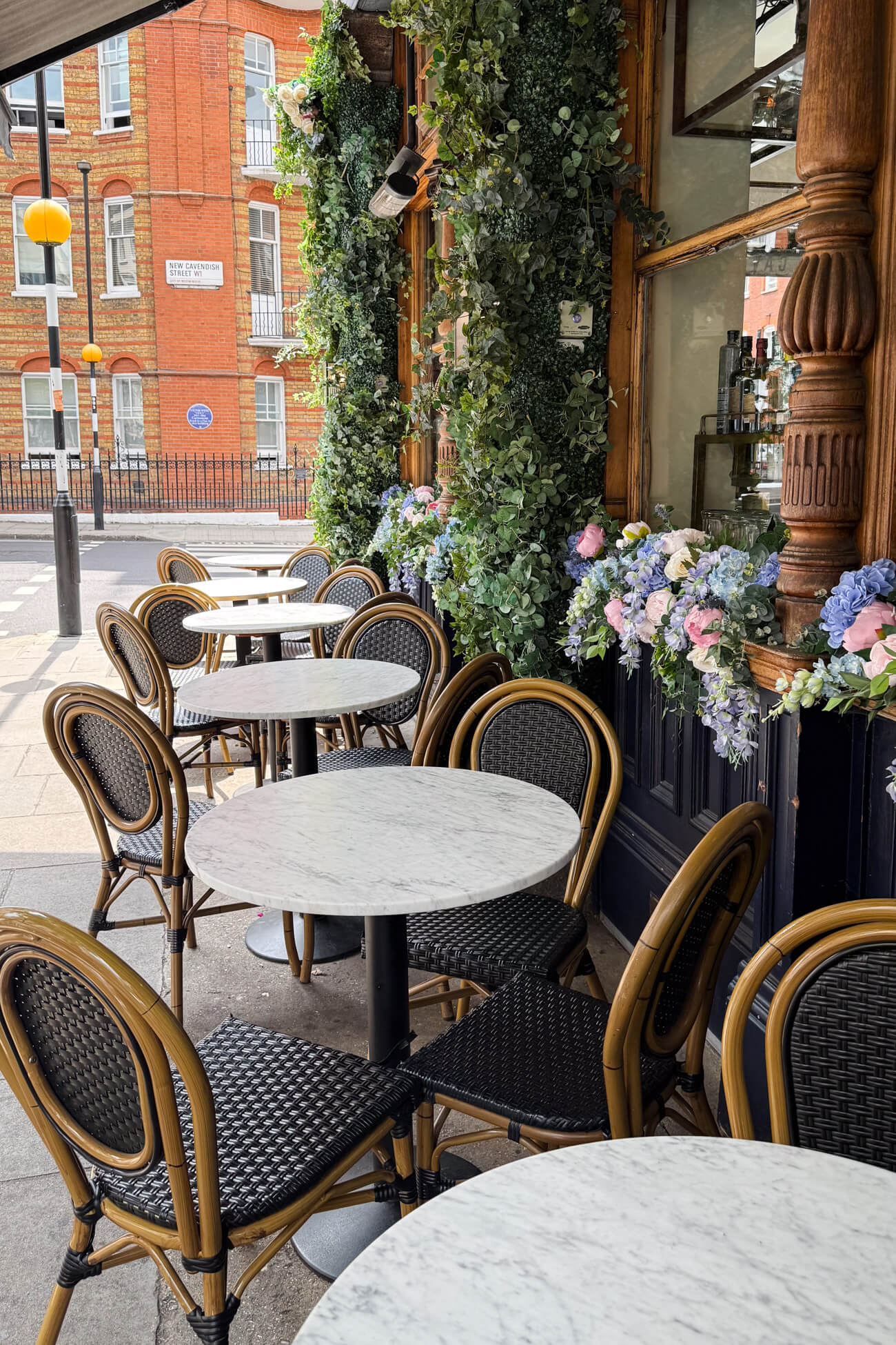 The outside of The Cavendish, a beautiful pub in Marylebone that's adorned with flowers. 