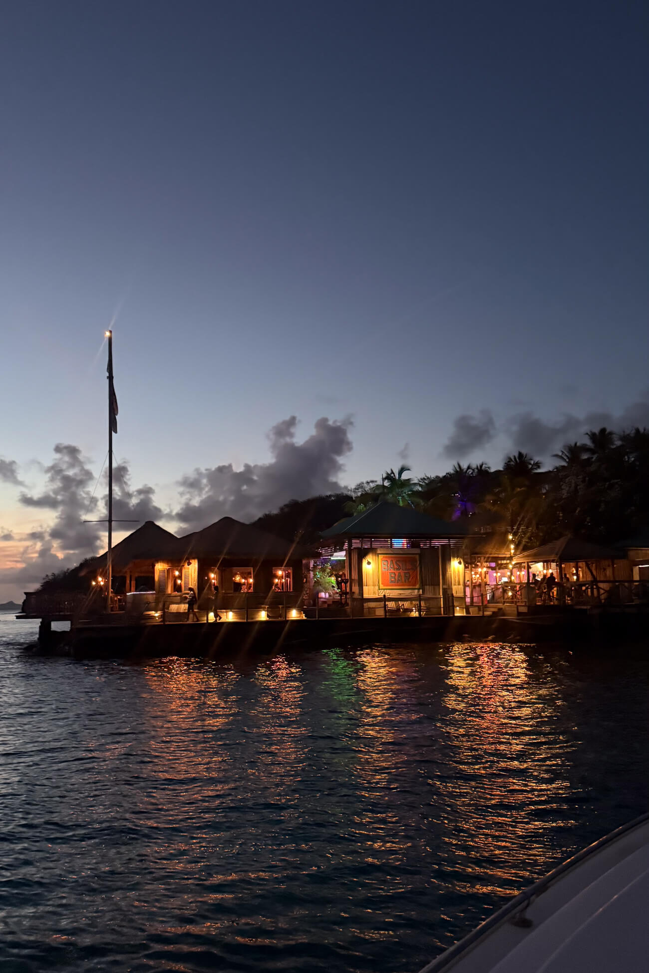 Basil's Bar Mustique Arriving by boat at Basil’s Bar on Mustique Island at dusk for the famous weekly Jump Up.